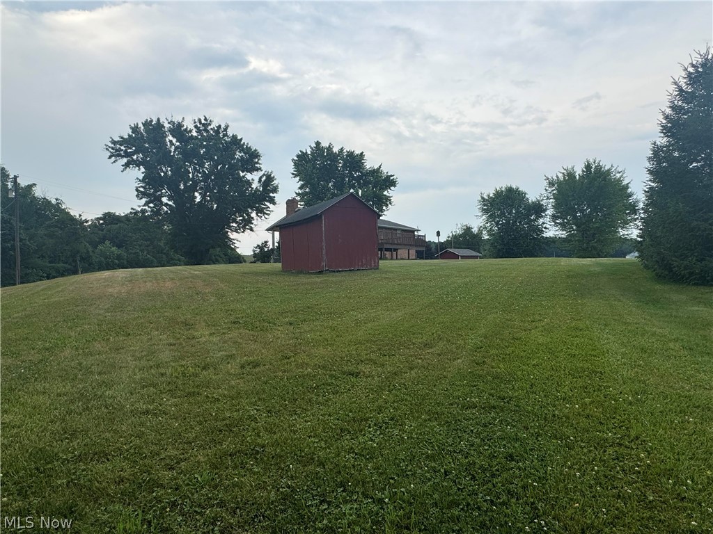 23656 Sandy Creek Road Minerva, OH 44657 - Photo 16 of 19 View of yard with an outdoor structure