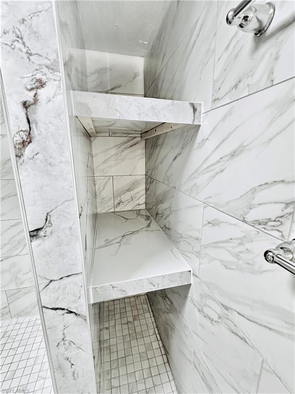 826 Wiggins Pass Road, Unit 307 Naples, FL 34110 - Photo 17 of 17 a view of a walk in closet