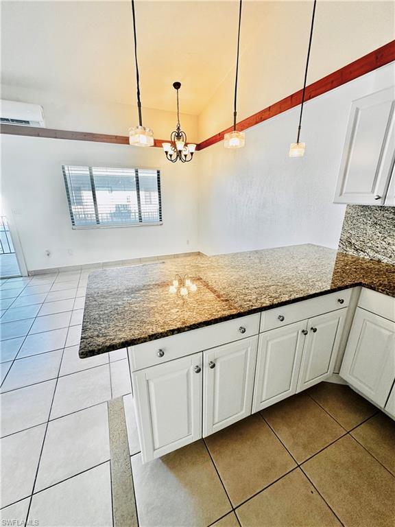 826 Wiggins Pass Road, Unit 307 Naples, FL 34110 - Photo 8 of 17 a view of a kitchen counter space