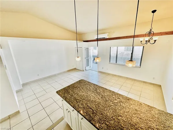 a view of a kitchen with a sink