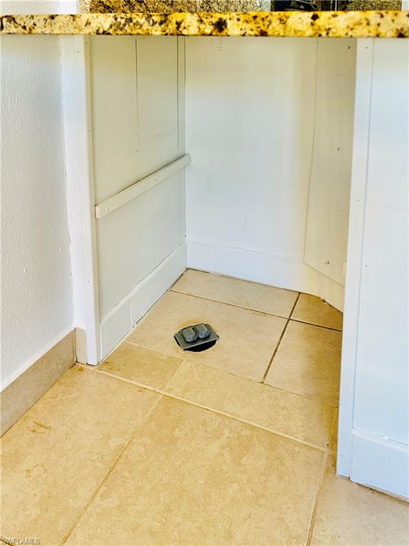 826 Wiggins Pass Road, Unit 307 Naples, FL 34110 - Photo 10 of 17 a view of a garage