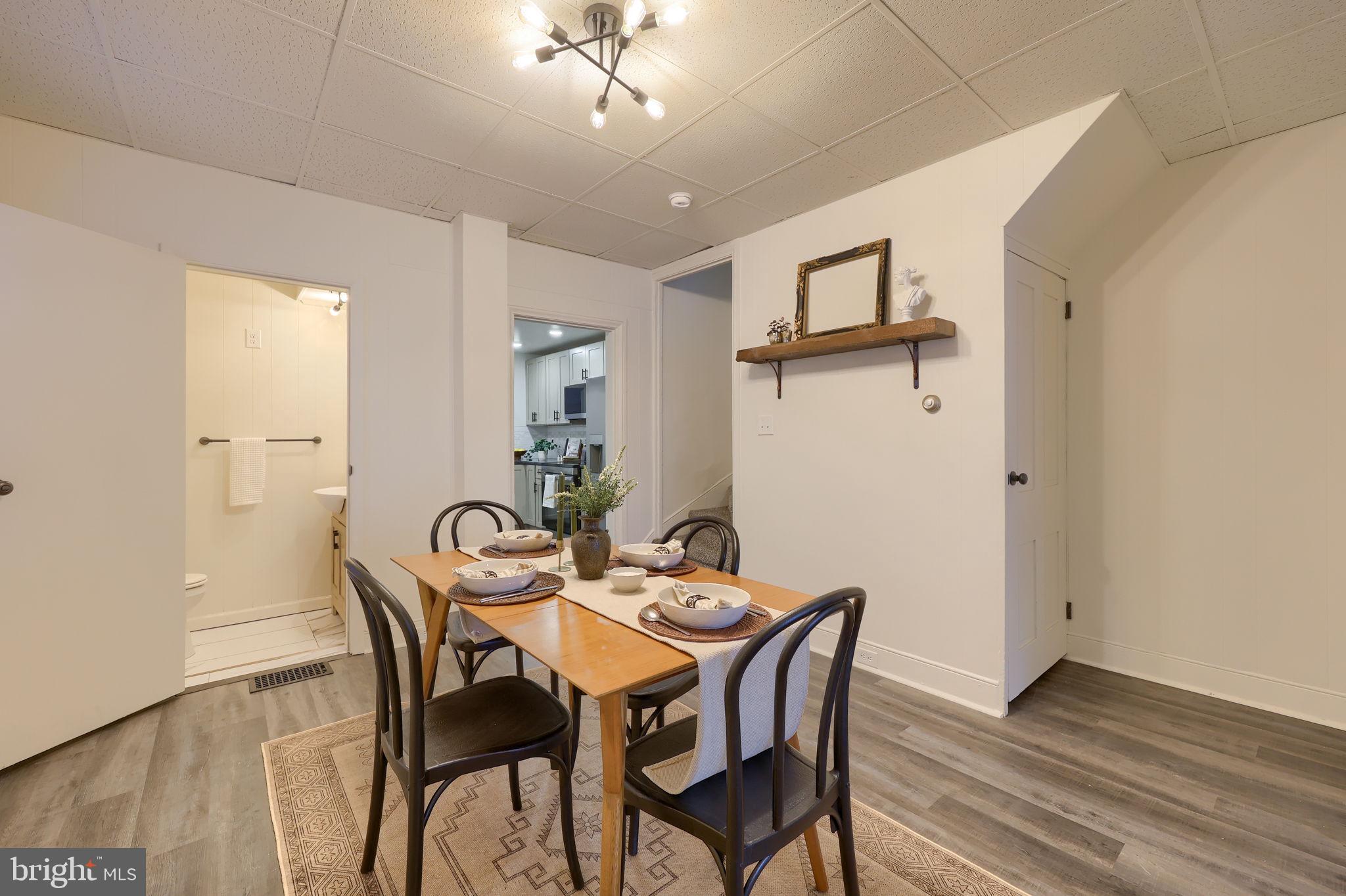 244 South 5th Street Columbia, PA 17512 - Photo 12 of 45 a view of a dining room with furniture and wooden floor