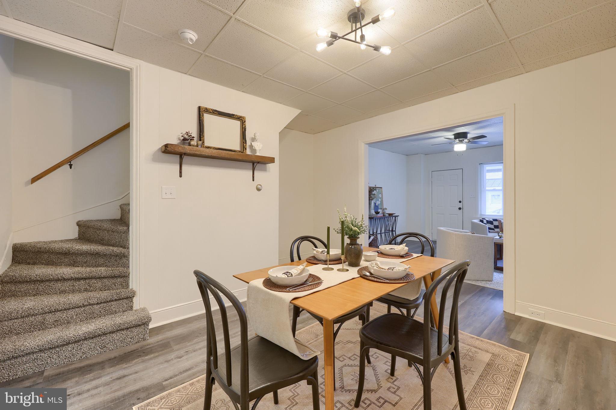 244 South 5th Street Columbia, PA 17512 - Photo 13 of 45 a view of a dining room with furniture and wooden floor