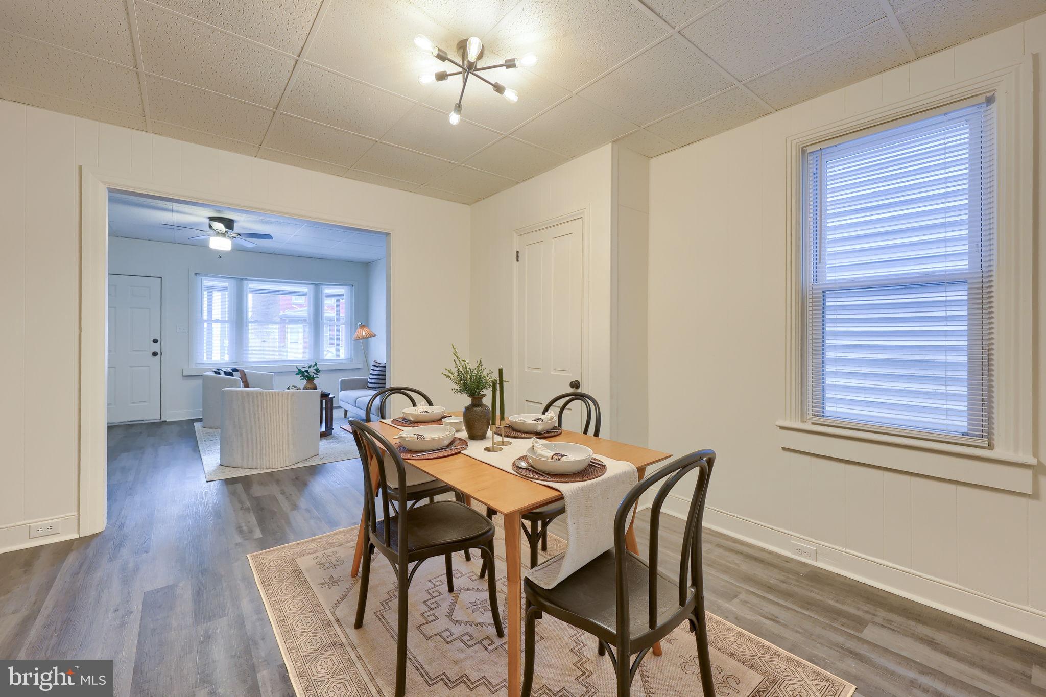 244 South 5th Street Columbia, PA 17512 - Photo 14 of 45 a view of a dining room with furniture window and wooden floor