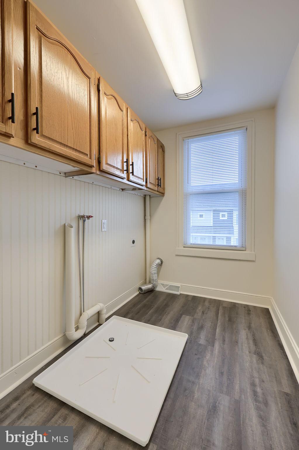 244 South 5th Street Columbia, PA 17512 - Photo 28 of 45 an empty room with wooden floor and windows