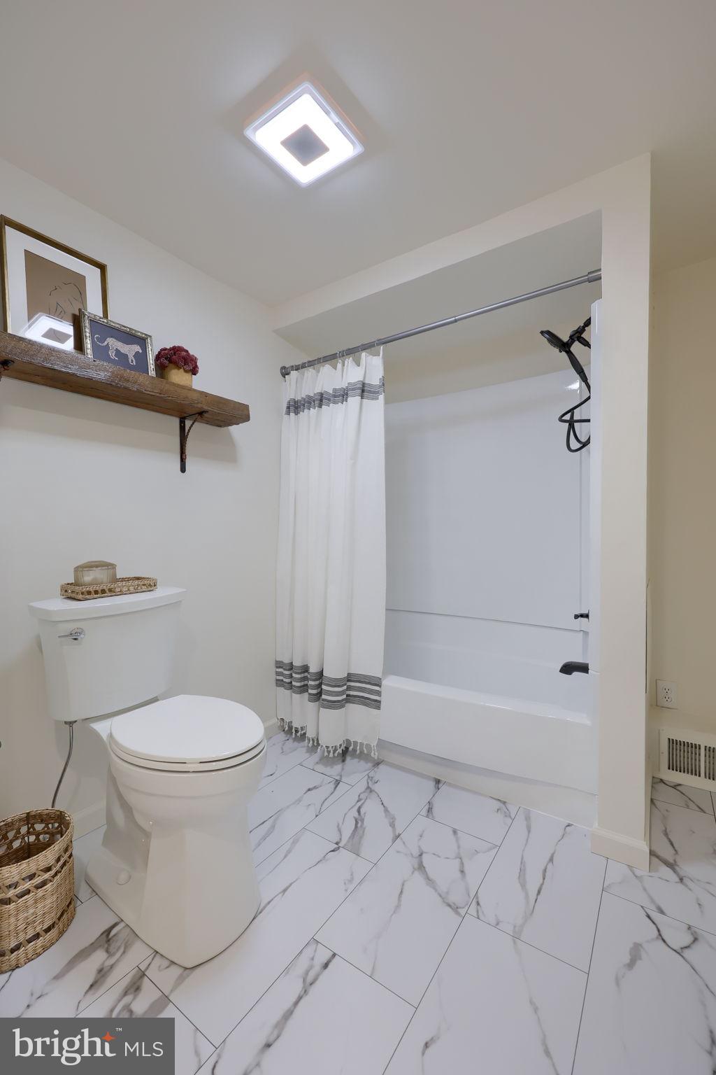 244 South 5th Street Columbia, PA 17512 - Photo 33 of 45 a bathroom with a toilet and a shower