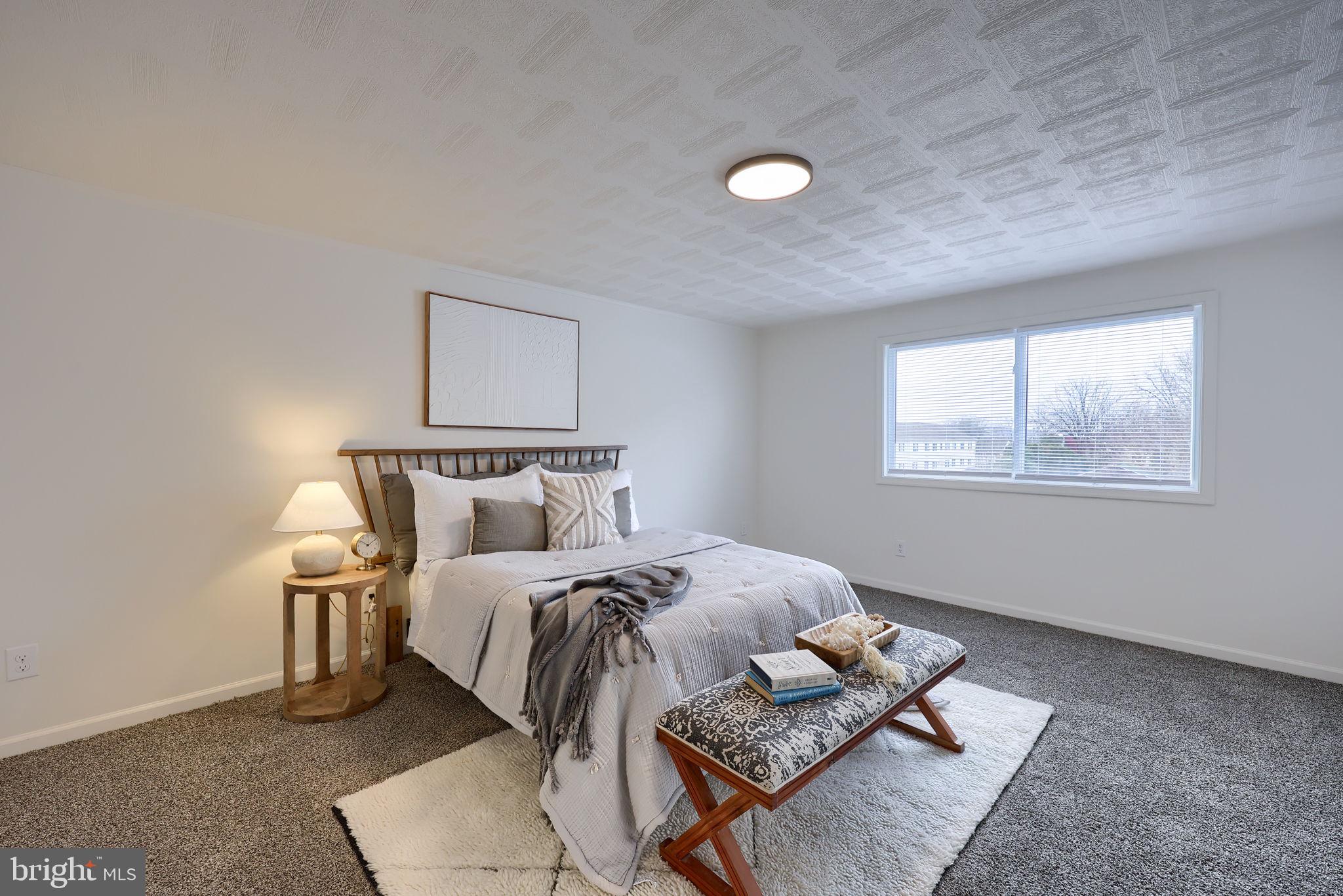 244 South 5th Street Columbia, PA 17512 - Photo 34 of 45 a bedroom with a bed and a window