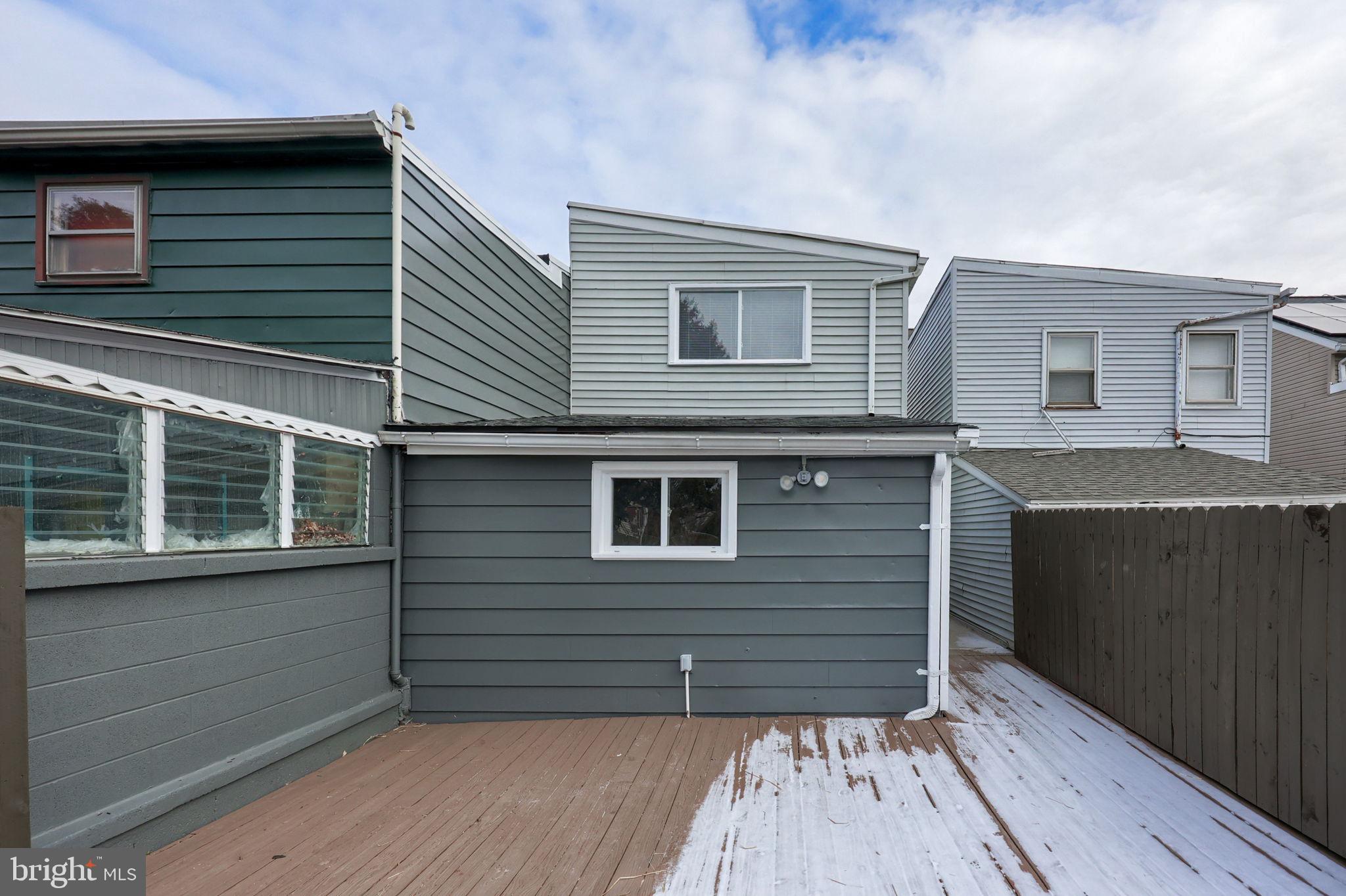 244 South 5th Street Columbia, PA 17512 - Photo 39 of 45 a view of a house with wooden deck