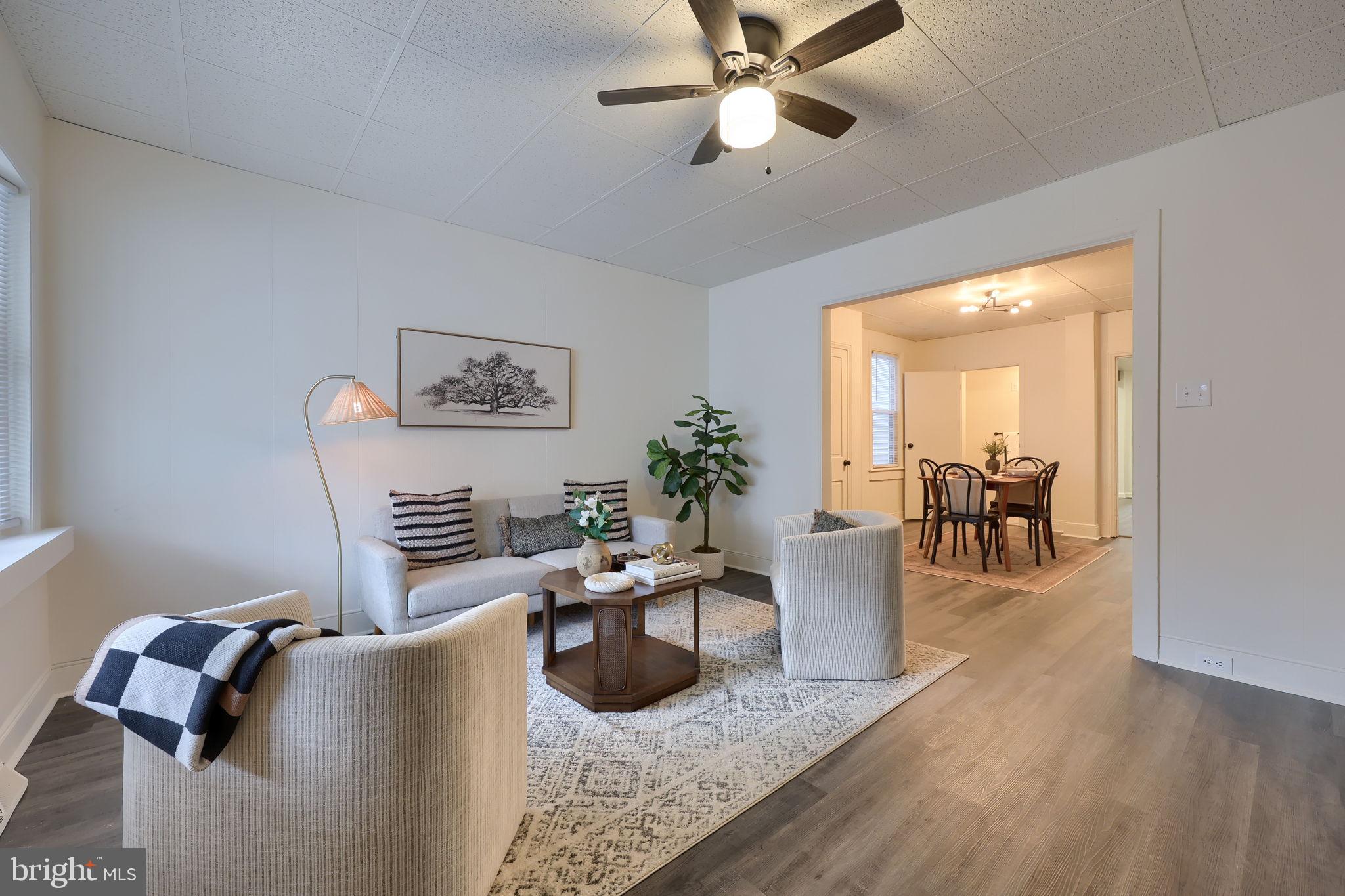 244 South 5th Street Columbia, PA 17512 - Photo 5 of 45 a living room with furniture and a large window