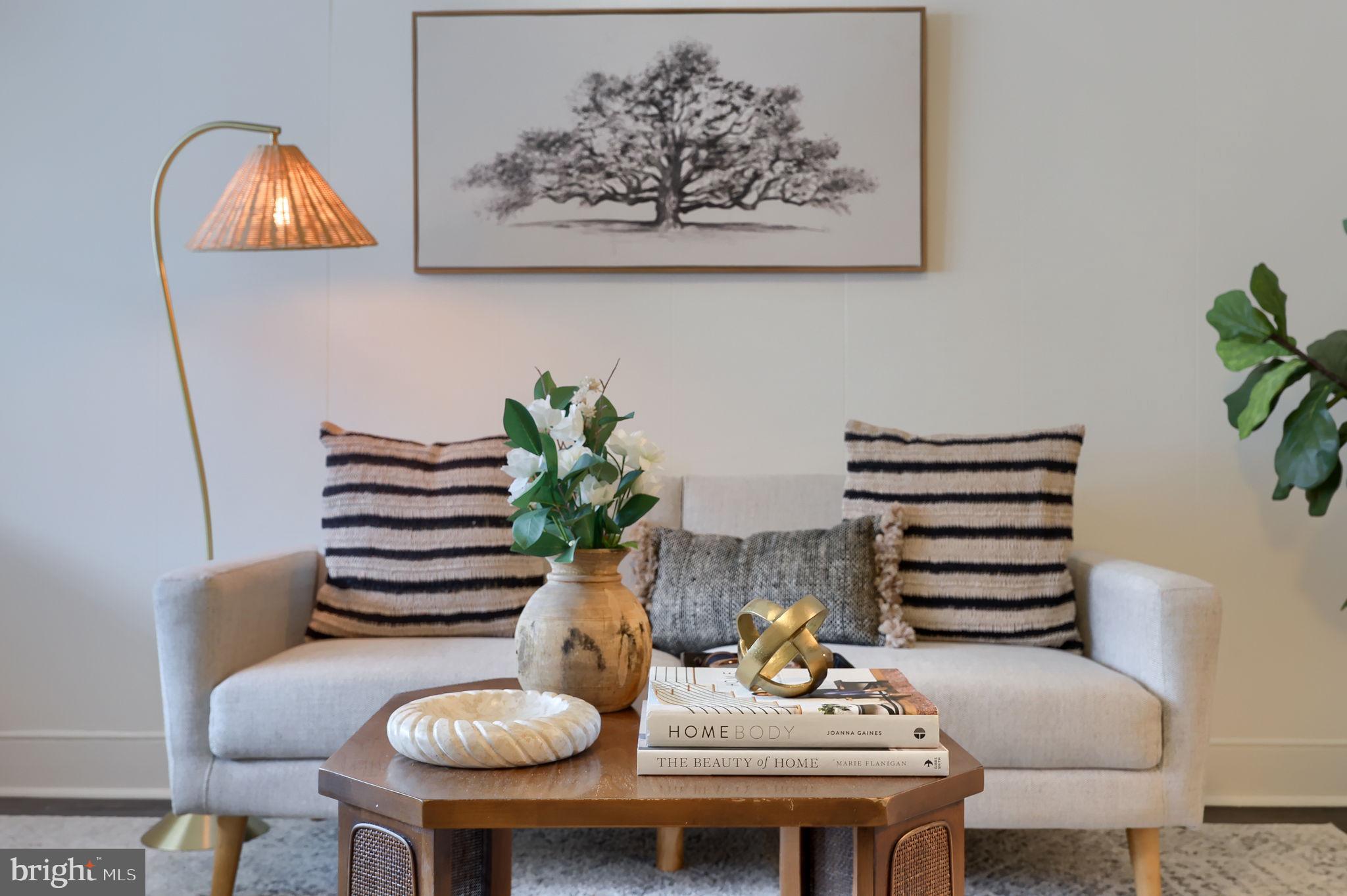 244 South 5th Street Columbia, PA 17512 - Photo 10 of 45 a living room with furniture and a potted plant