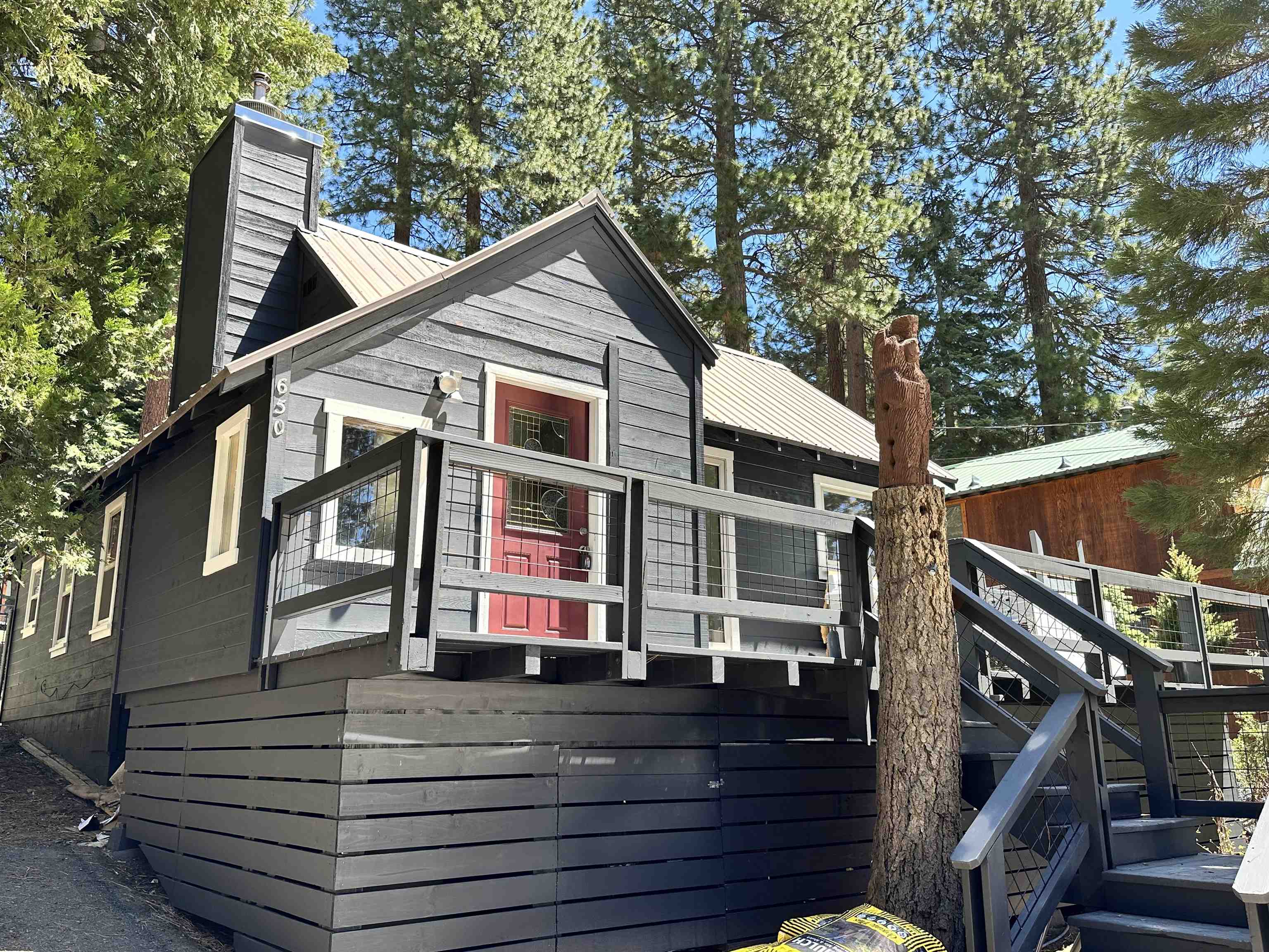 650 Chipmunk Street Kings Beach, CA 96143 - Photo 1 of 8 a view of house with a yard