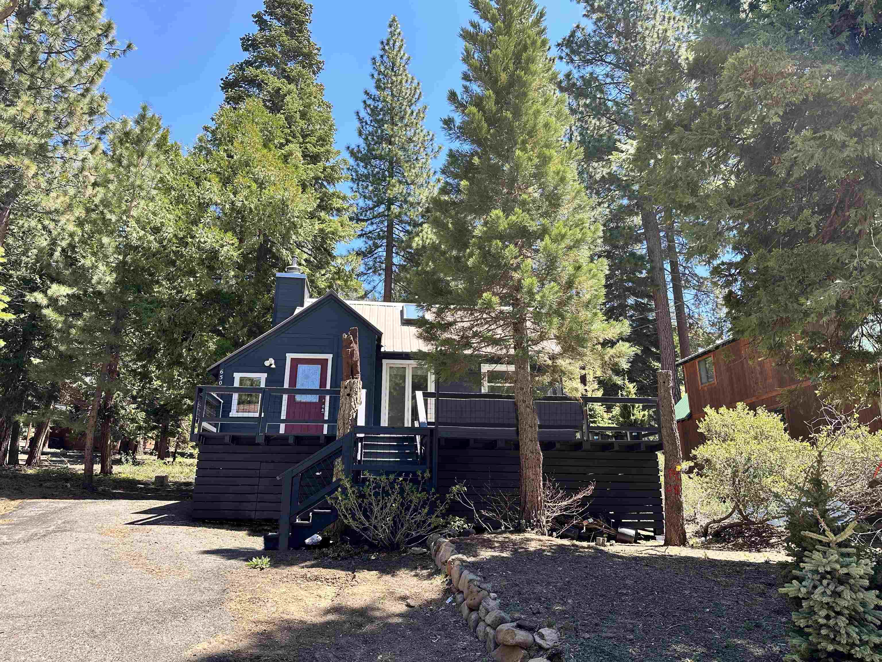 650 Chipmunk Street Kings Beach, CA 96143 - Photo 8 of 8 a front view of a house with a yard