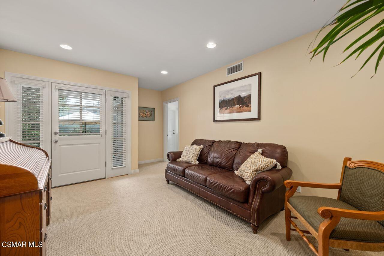 11616 Clarkson Road Los Angeles, CA 90064 - Photo 15 of 34 a living room with furniture and a window