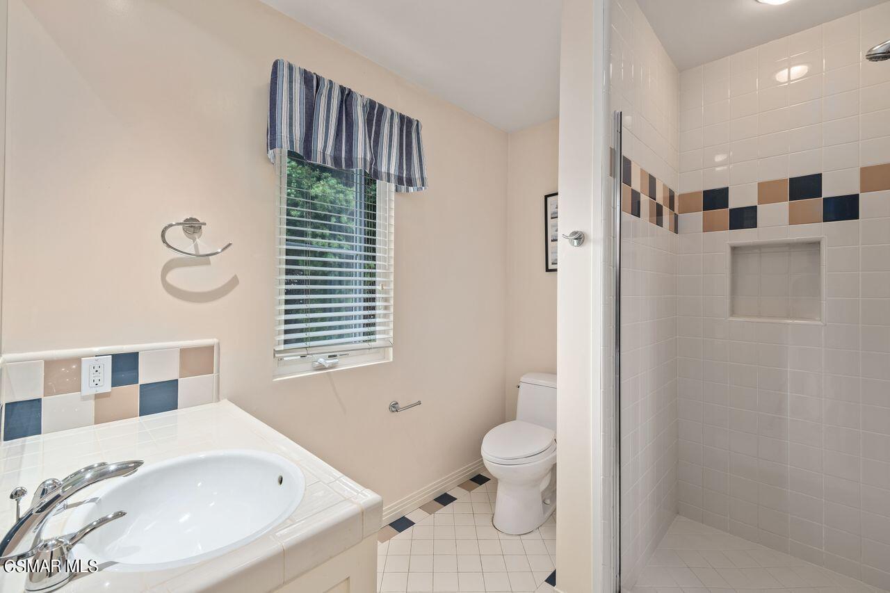 11616 Clarkson Road Los Angeles, CA 90064 - Photo 24 of 34 a bathroom with a sink toilet and shower