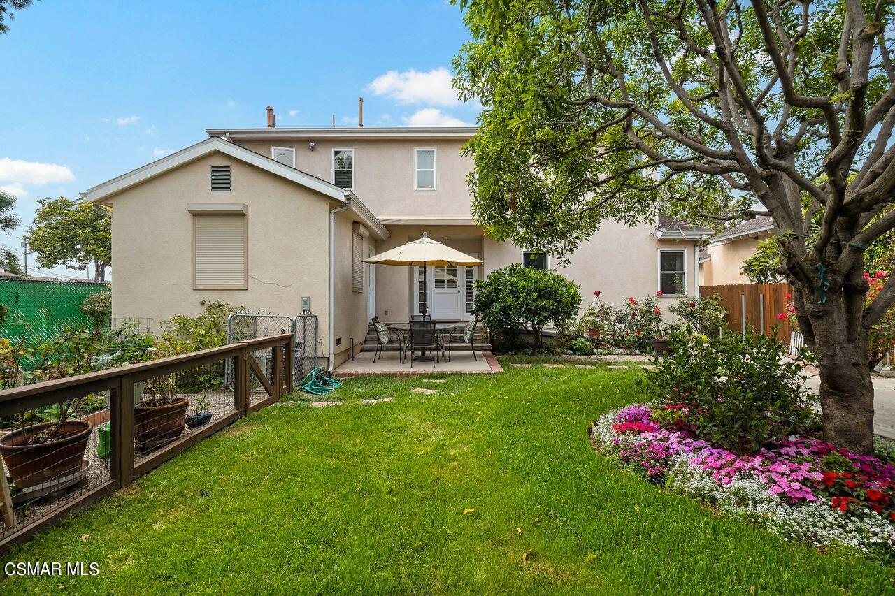 11616 Clarkson Road Los Angeles, CA 90064 - Photo 31 of 34 a view of an house with backyard space and garden