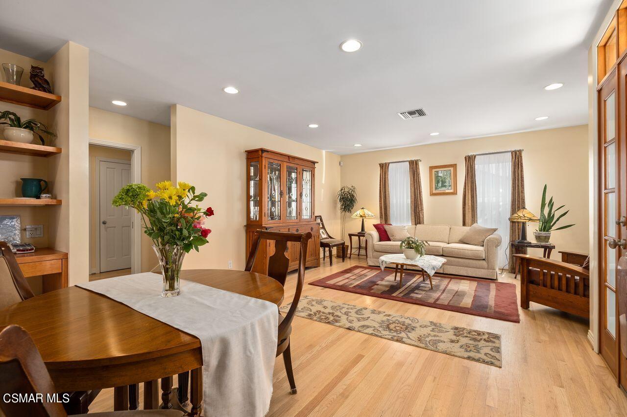 11616 Clarkson Road Los Angeles, CA 90064 - Photo 9 of 34 a living room with furniture potted plant and a table