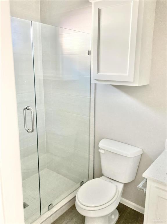 7702 North 58th Street, Unit 3 Mission, TX 78573 - Photo 7 of 11 Bathroom featuring vanity and a shower stall
