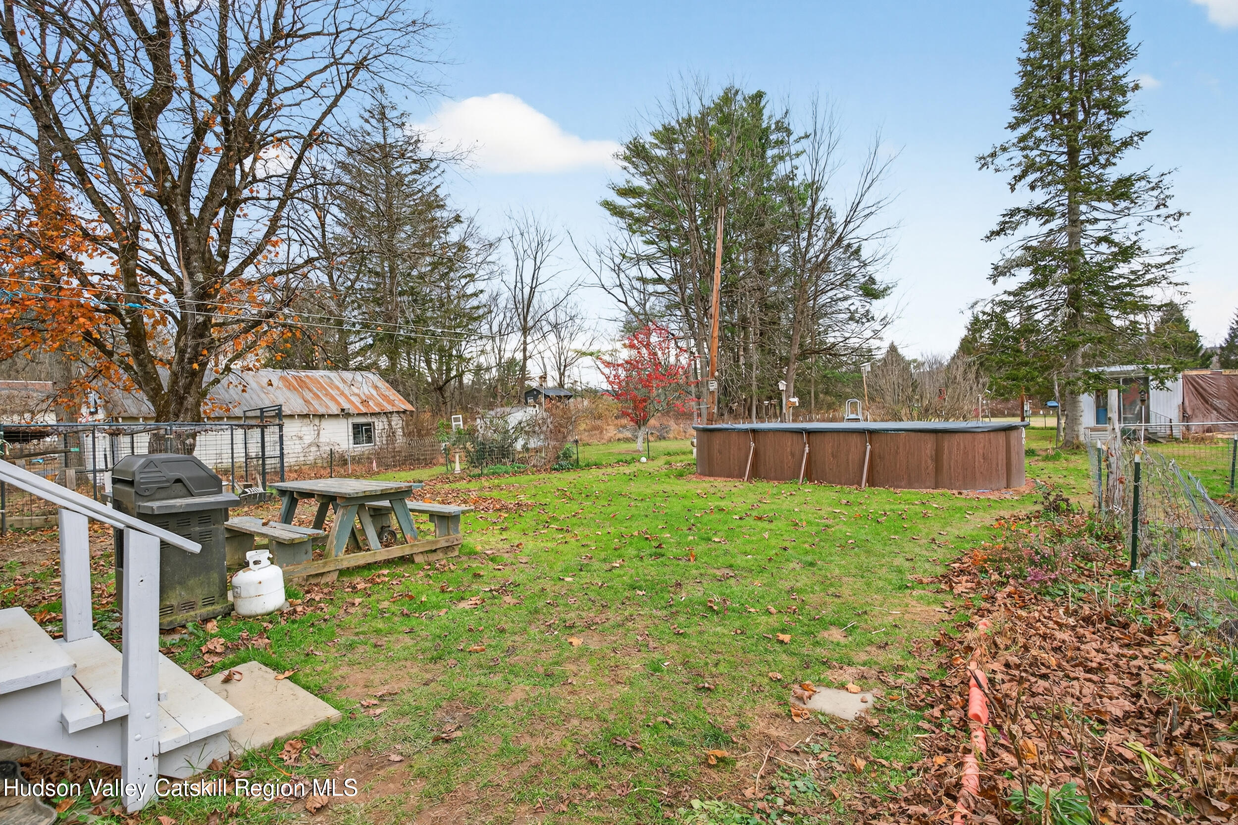 4030 Us Highway Stone Ridge, NY 12484 - Photo 21 of 22 a view of a house with backyard and a tree