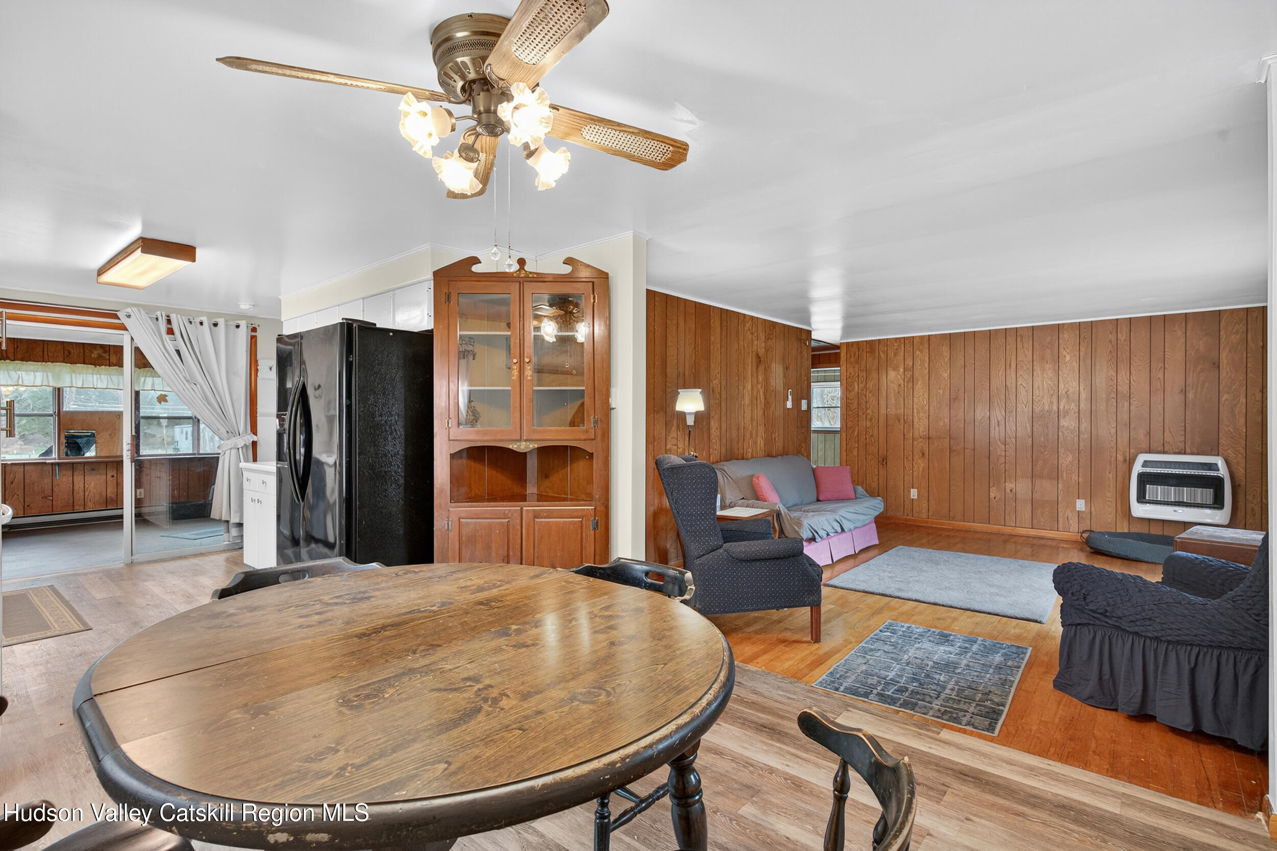 4030 Us Highway Stone Ridge, NY 12484 - Photo 7 of 22 a living room with furniture and a chandelier