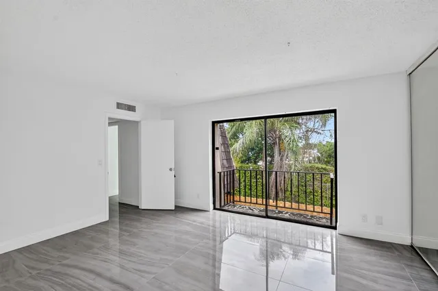 a view of a balcony with outdoor space