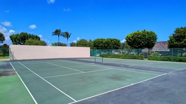 a view of an outdoor space and tennis court