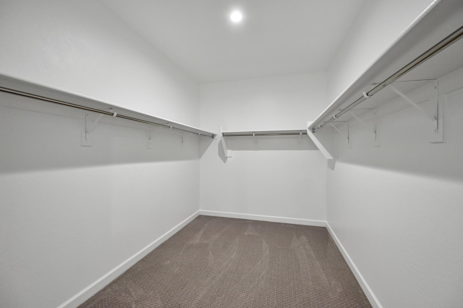 2129 West Spaulding Avenue Apache Junction, AZ 85120 - Photo 17 of 28 a view of a room with empty racks