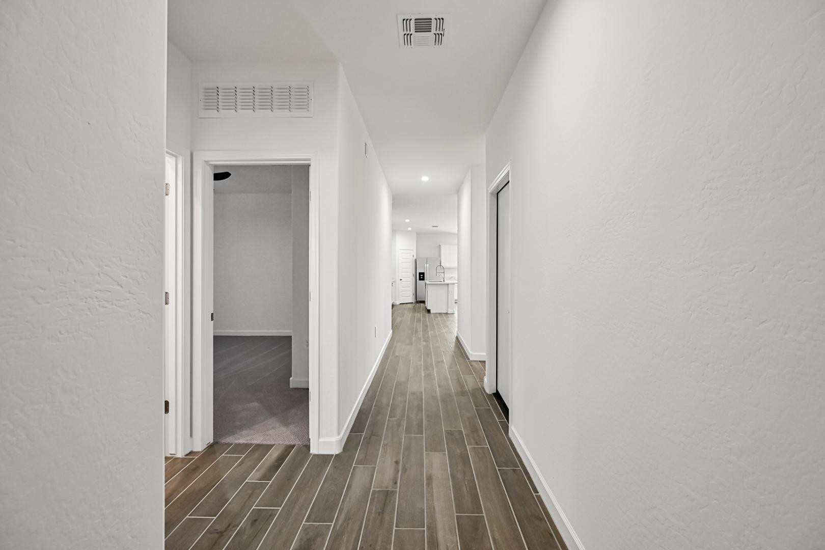 2129 West Spaulding Avenue Apache Junction, AZ 85120 - Photo 2 of 28 a view of a room with wooden floor