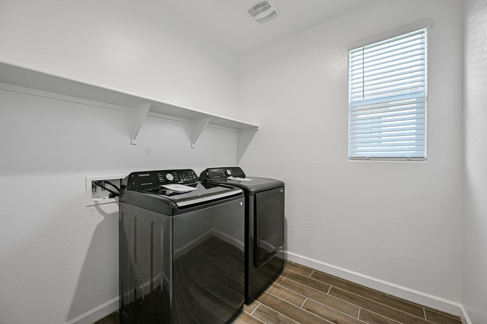 2129 West Spaulding Avenue Apache Junction, AZ 85120 - Photo 25 of 28 a utility room with dryer and washer