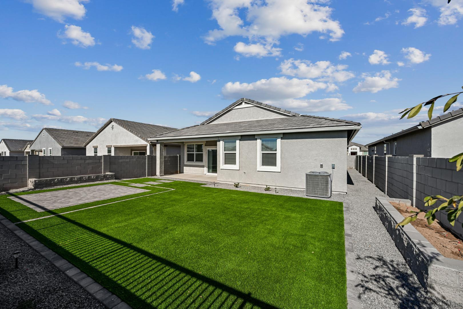 2129 West Spaulding Avenue Apache Junction, AZ 85120 - Photo 28 of 28 a front view of a house with yard patio and green space
