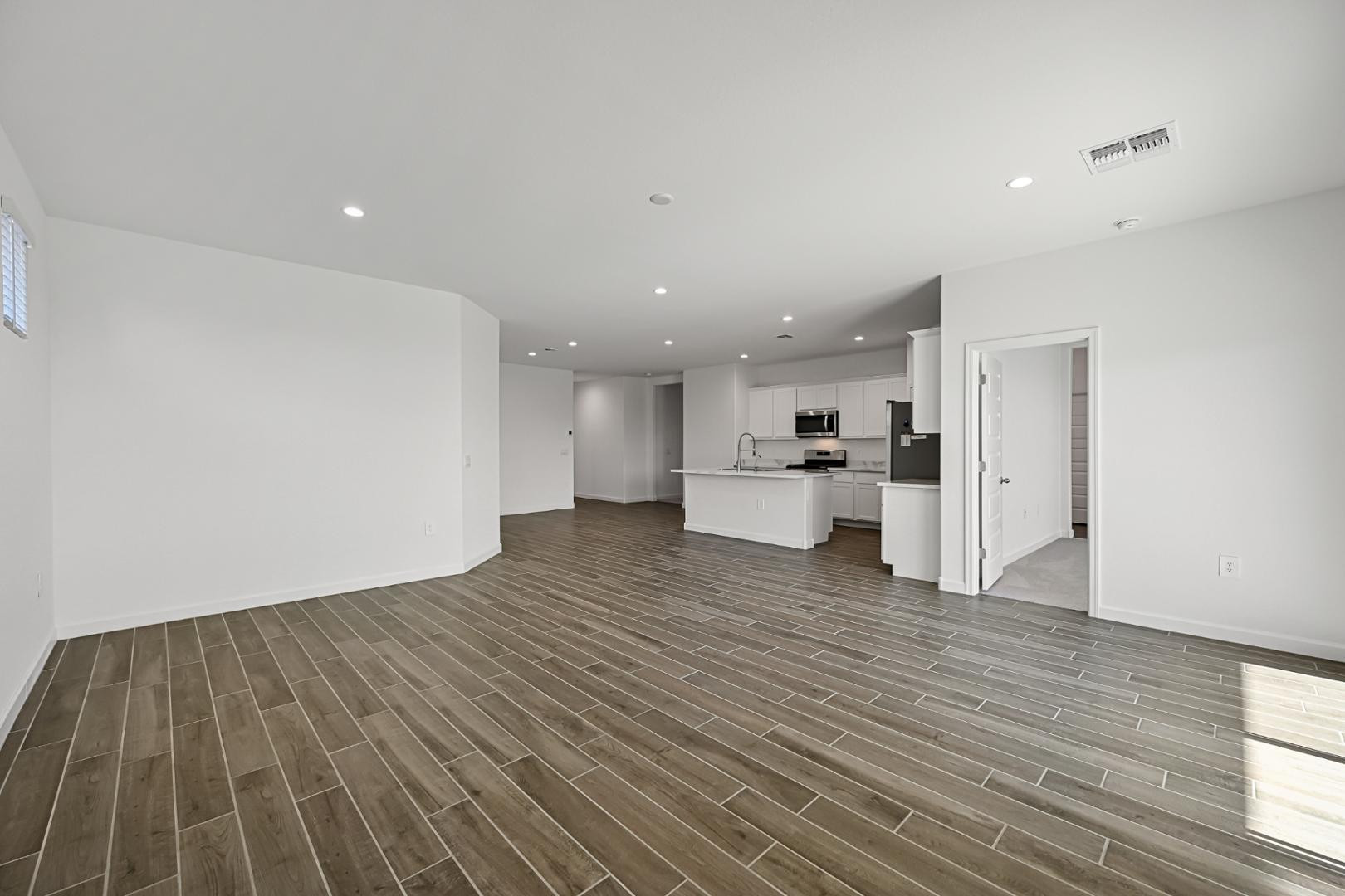 2129 West Spaulding Avenue Apache Junction, AZ 85120 - Photo 5 of 28 a view of kitchen with wooden floor