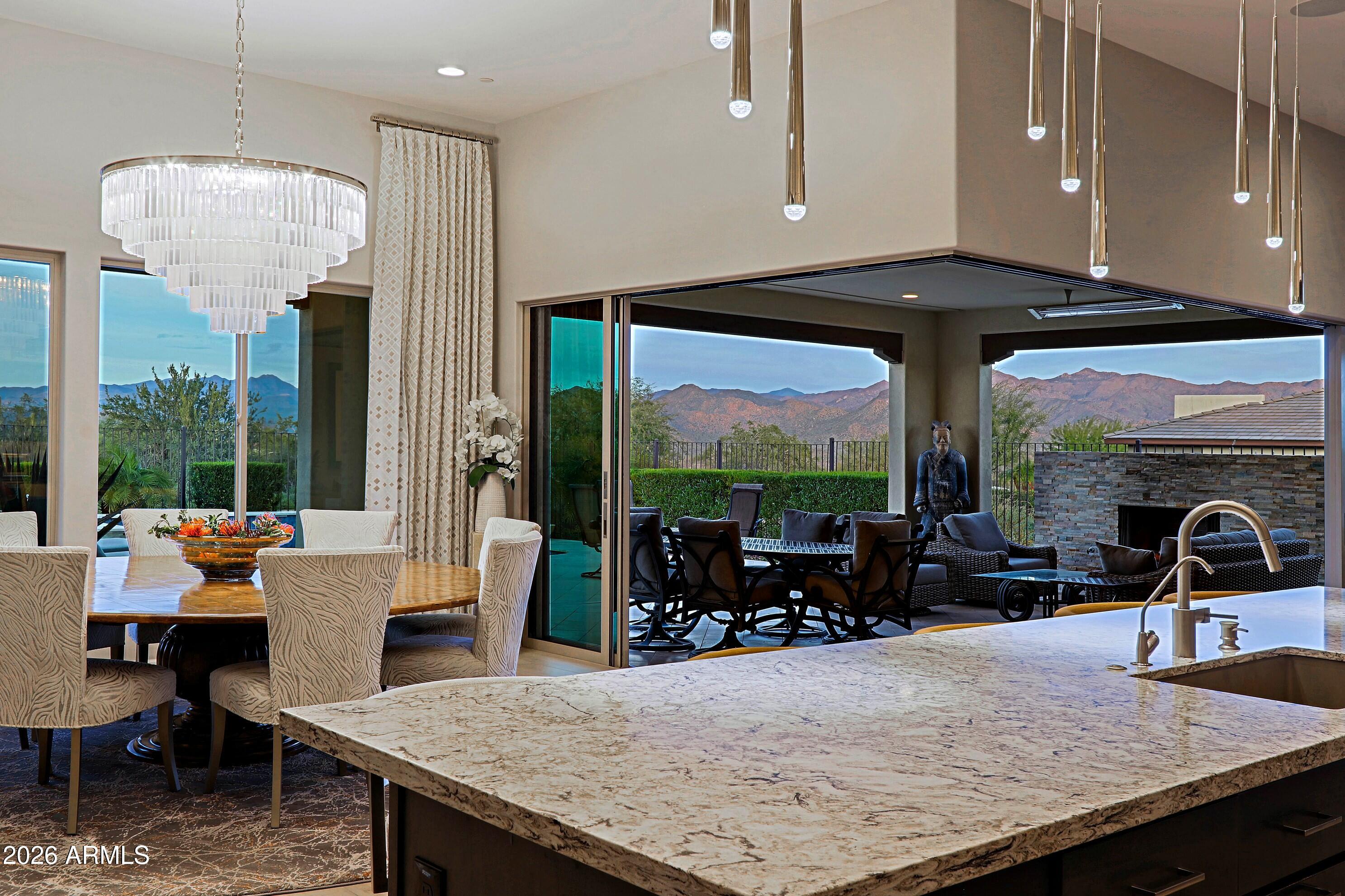 17864 East Paria Canyon Drive Rio Verde, AZ 85263 - Photo 16 of 66 a view of a dining room with furniture window and outside view