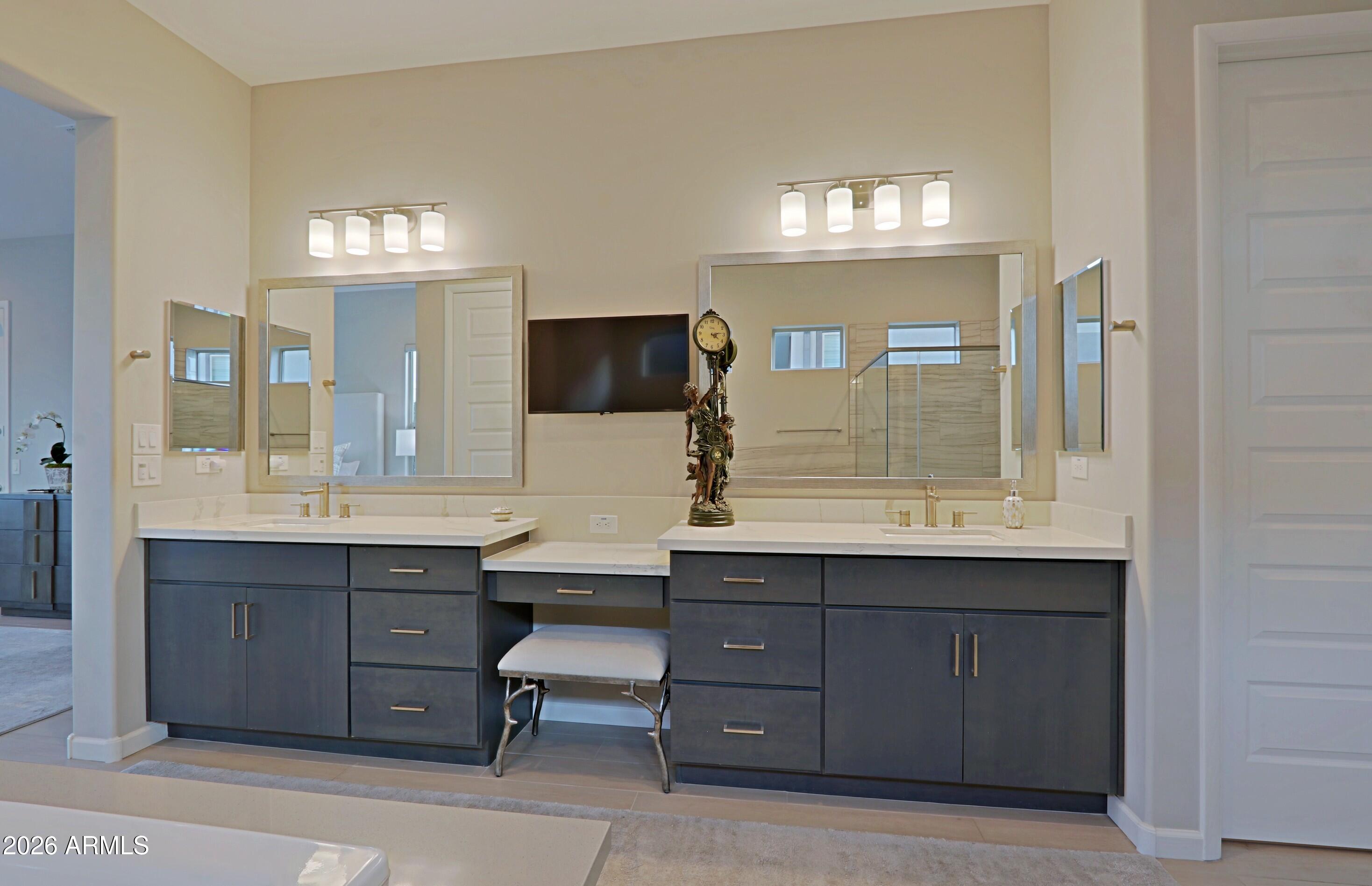 17864 East Paria Canyon Drive Rio Verde, AZ 85263 - Photo 26 of 66 a bathroom with a sink double vanity granite and a mirror
