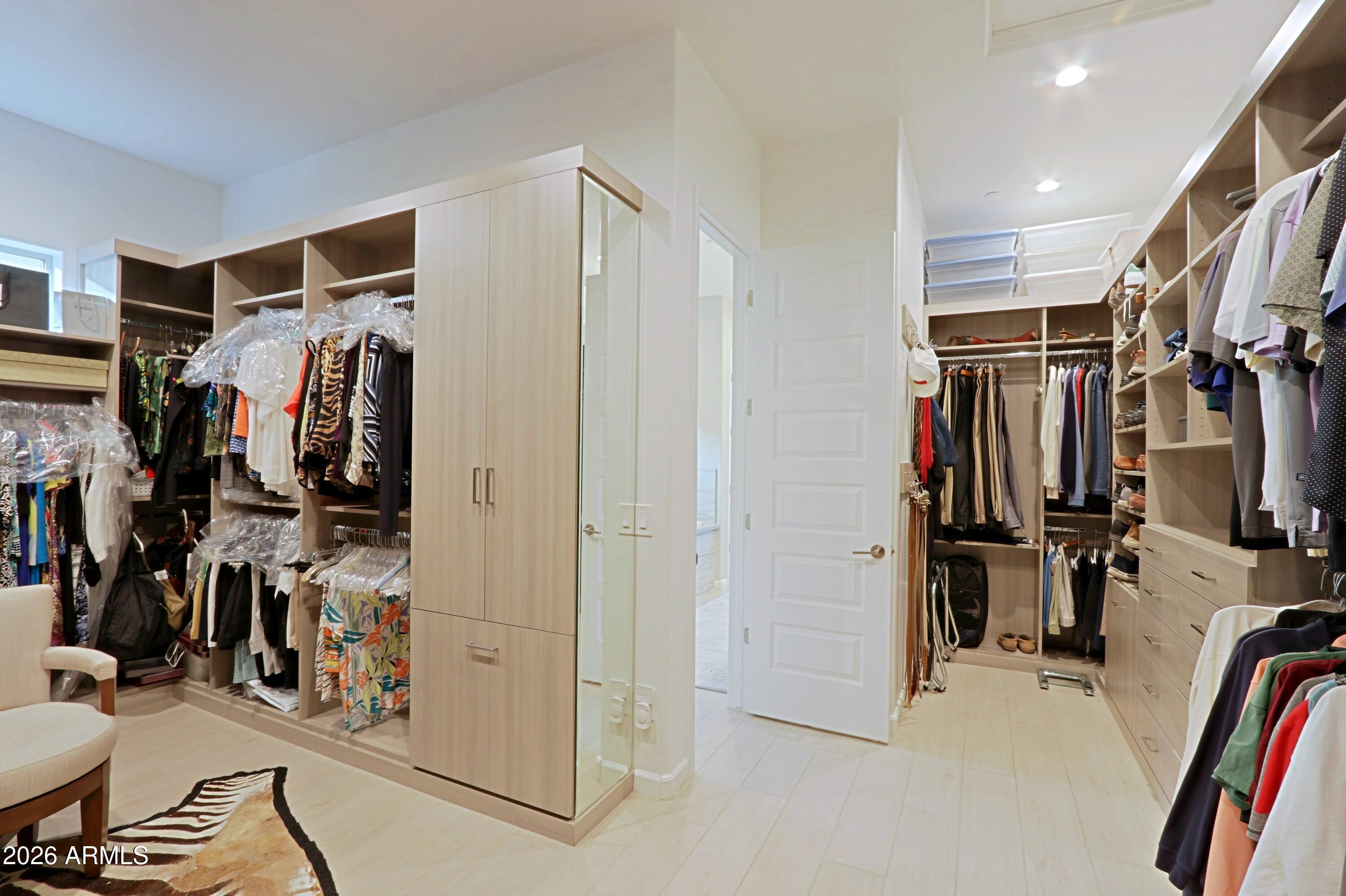 17864 East Paria Canyon Drive Rio Verde, AZ 85263 - Photo 29 of 66 a view of walk in closet with clothes and shoes