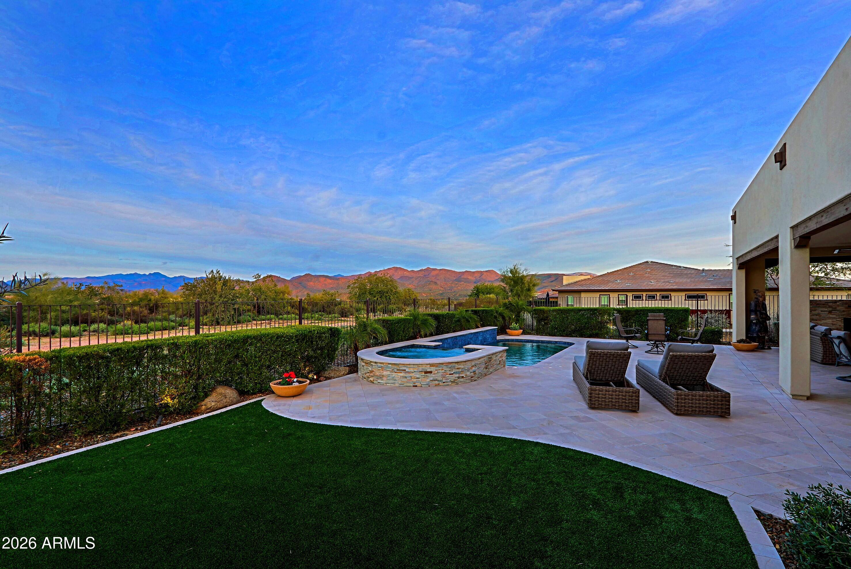 17864 East Paria Canyon Drive Rio Verde, AZ 85263 - Photo 38 of 66 a view of patio with couches and city view