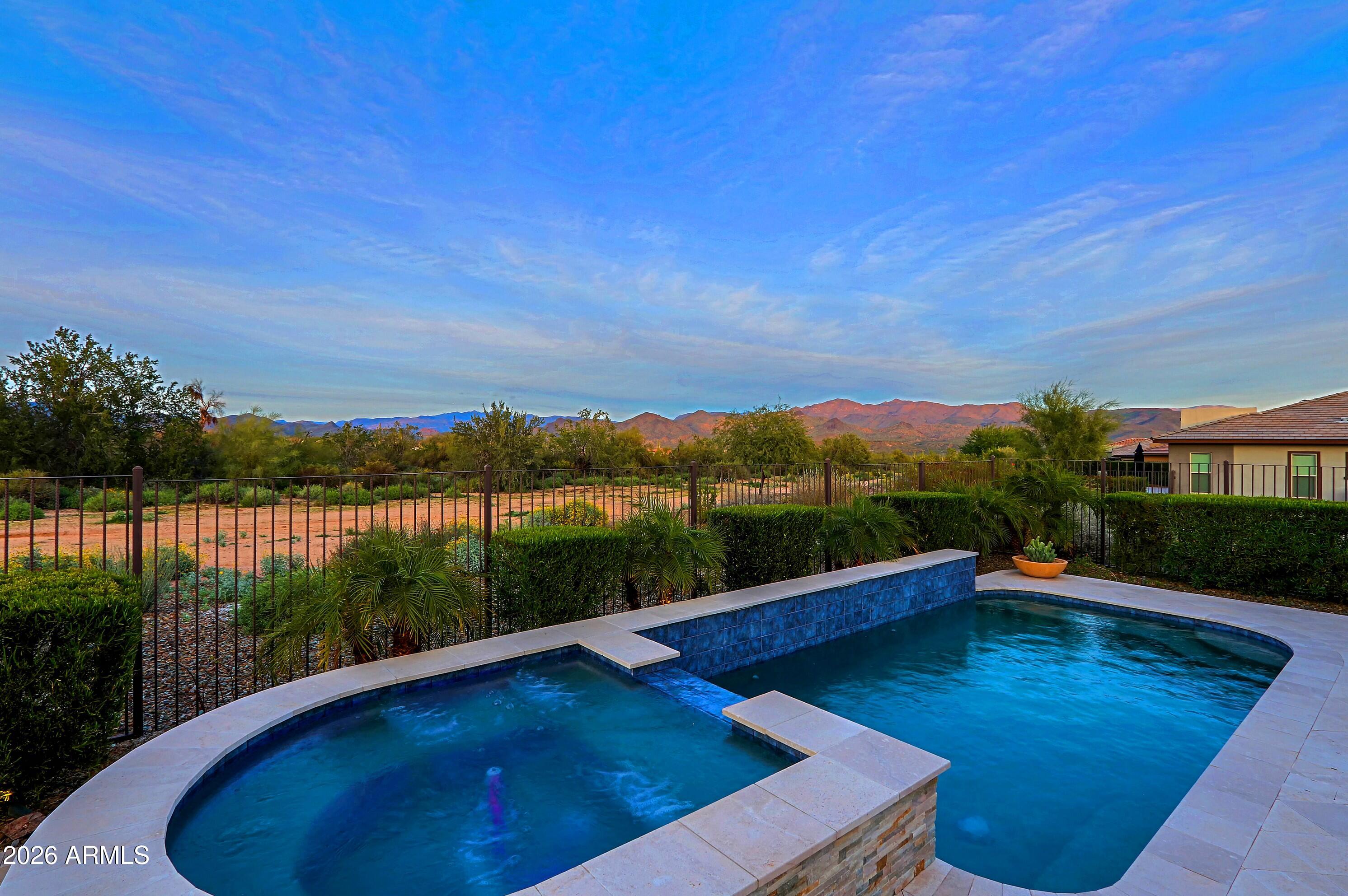 17864 East Paria Canyon Drive Rio Verde, AZ 85263 - Photo 40 of 66 a view of a swimming pool with a patio