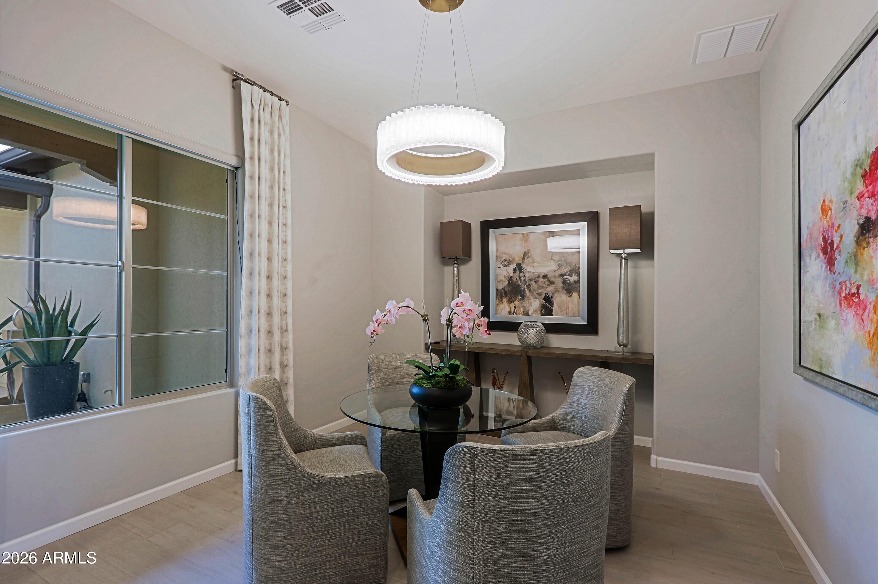 17864 East Paria Canyon Drive Rio Verde, AZ 85263 - Photo 4 of 66 a dining room with furniture and window