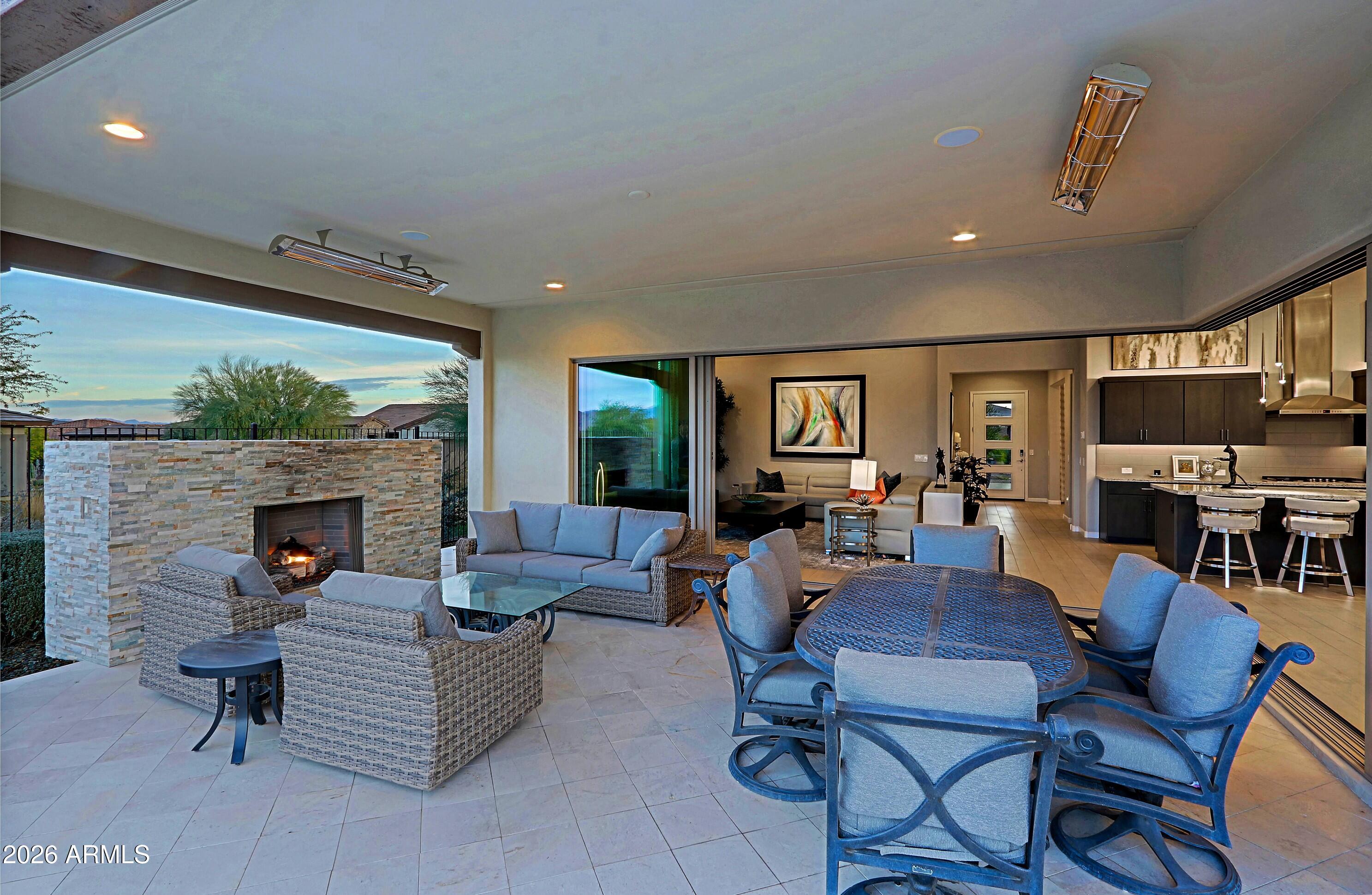 17864 East Paria Canyon Drive Rio Verde, AZ 85263 - Photo 43 of 66 a living room with fireplace furniture and a flat screen tv