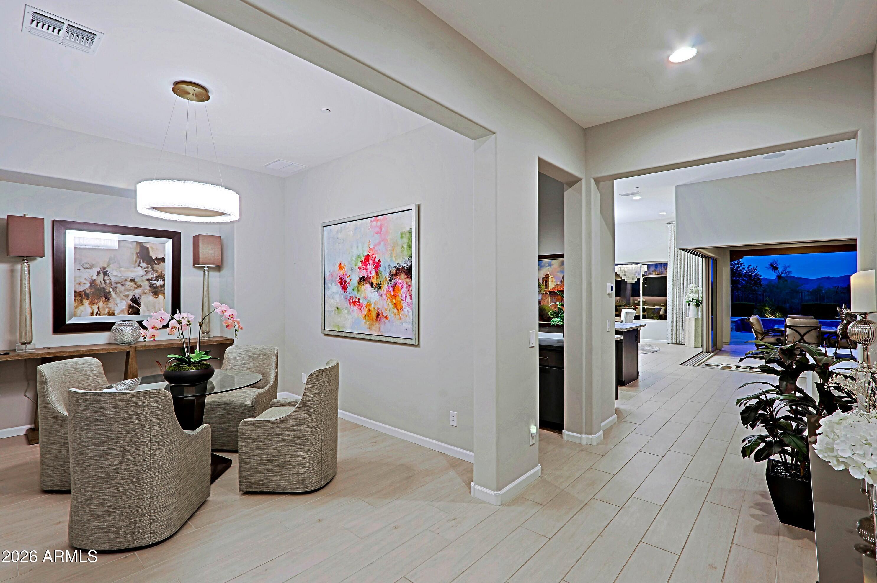 17864 East Paria Canyon Drive Rio Verde, AZ 85263 - Photo 5 of 66 a living room with furniture flowerpot and a window