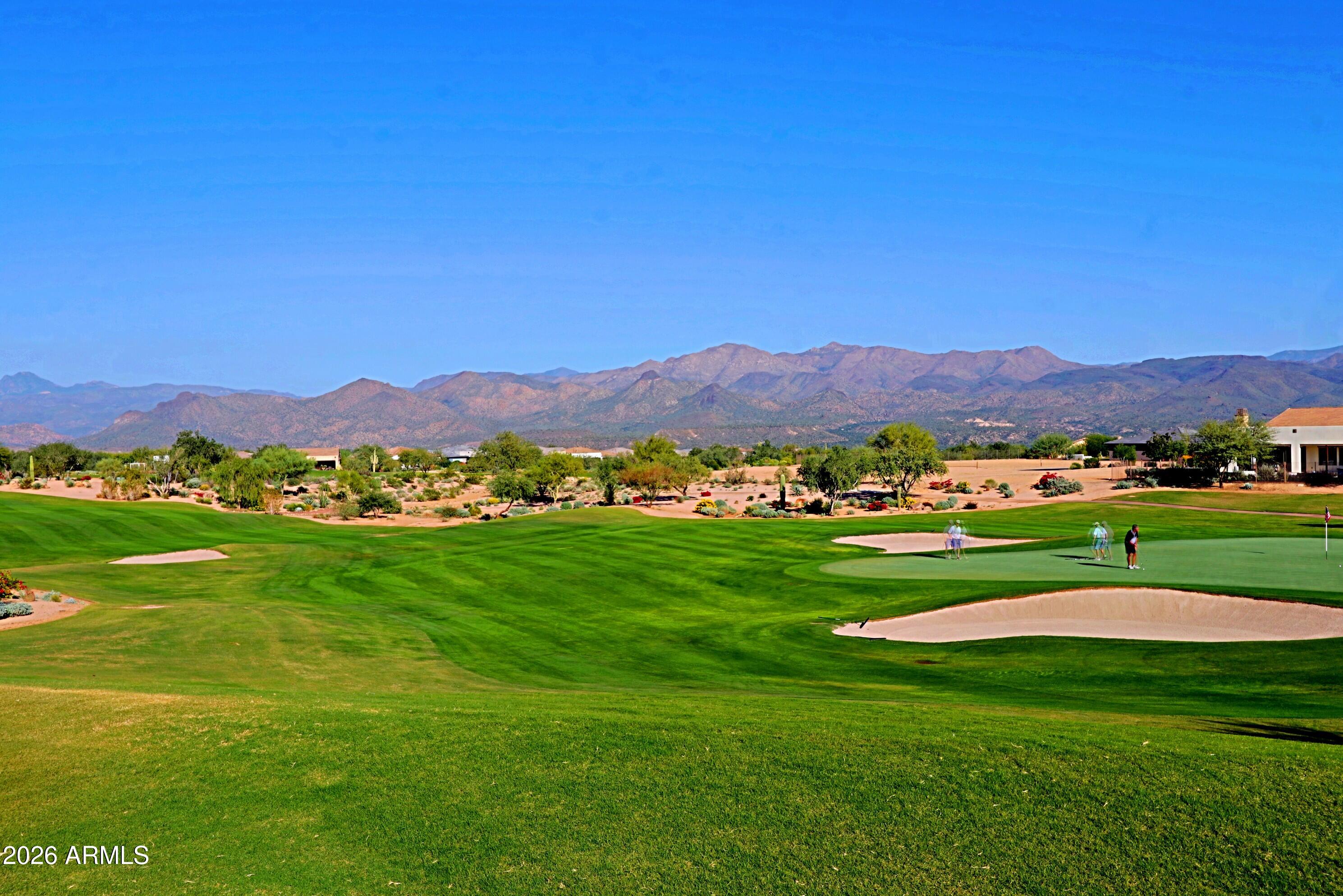 17864 East Paria Canyon Drive Rio Verde, AZ 85263 - Photo 59 of 66 a view of a lush green hillside and houses