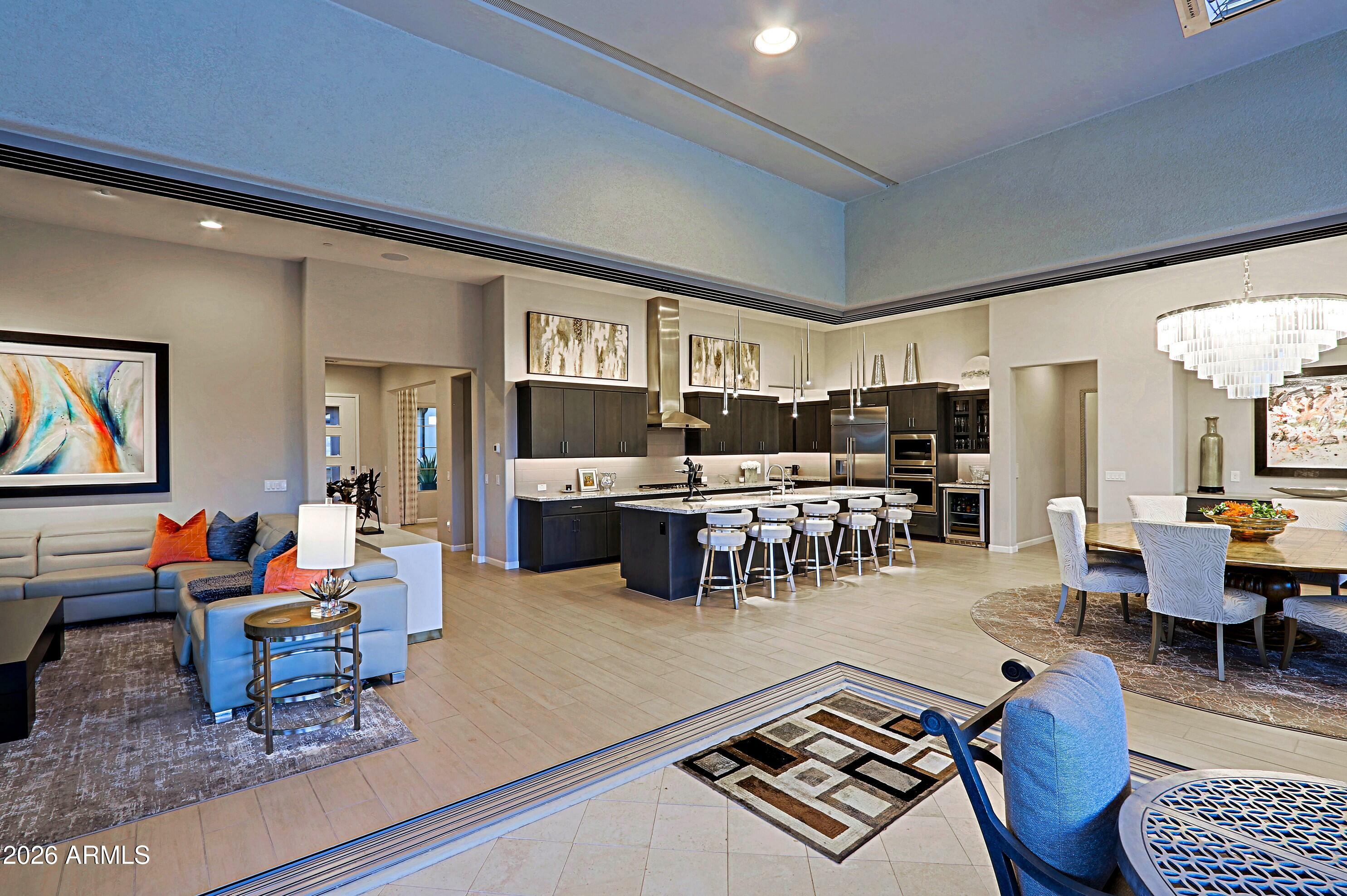 17864 East Paria Canyon Drive Rio Verde, AZ 85263 - Photo 10 of 66 a living room with lots of furniture and view kitchen