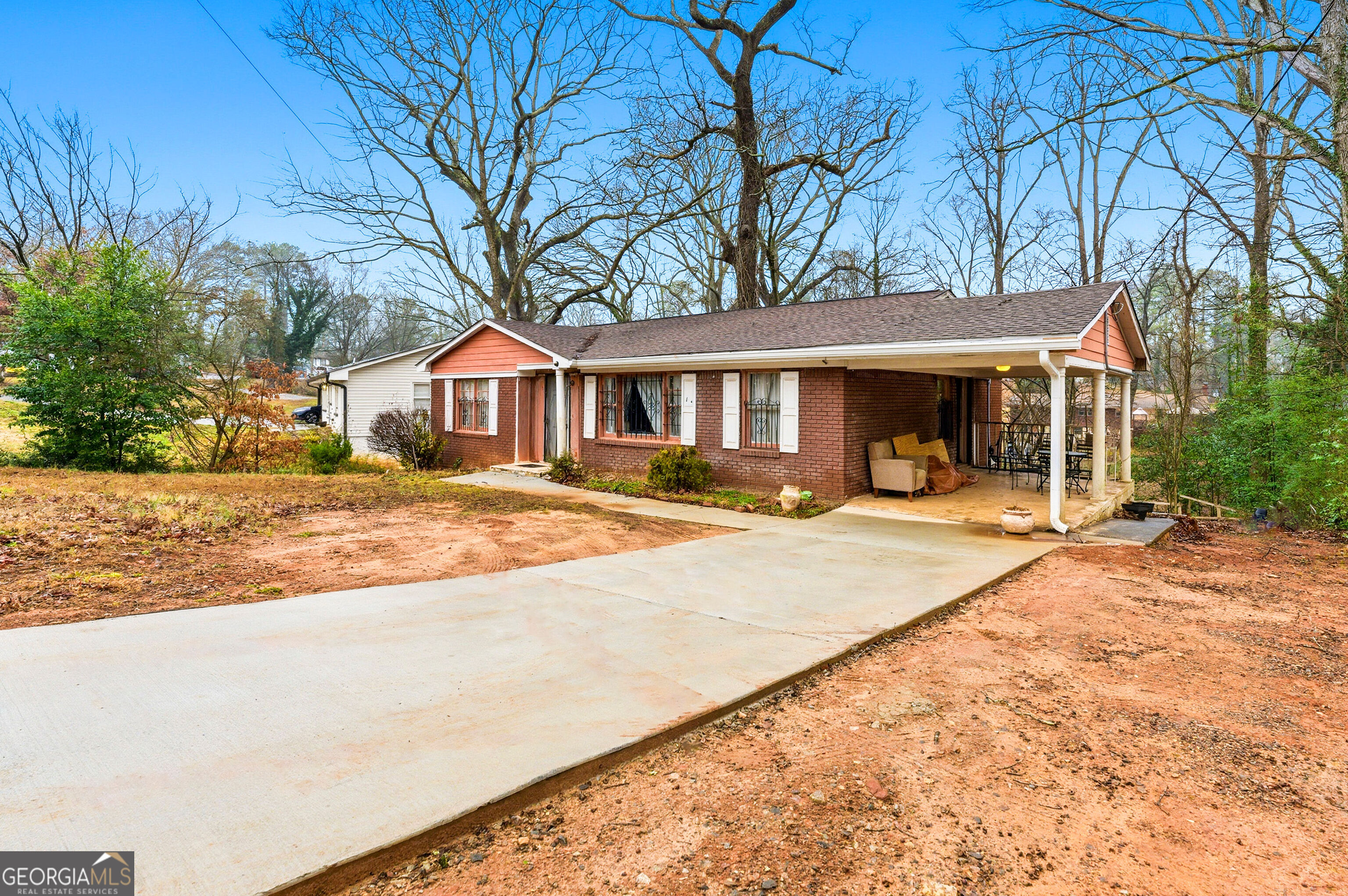 2848 Gresham Rd S East Atlanta, GA 30316 - Photo 2 of 20 a front view of a house with a yard