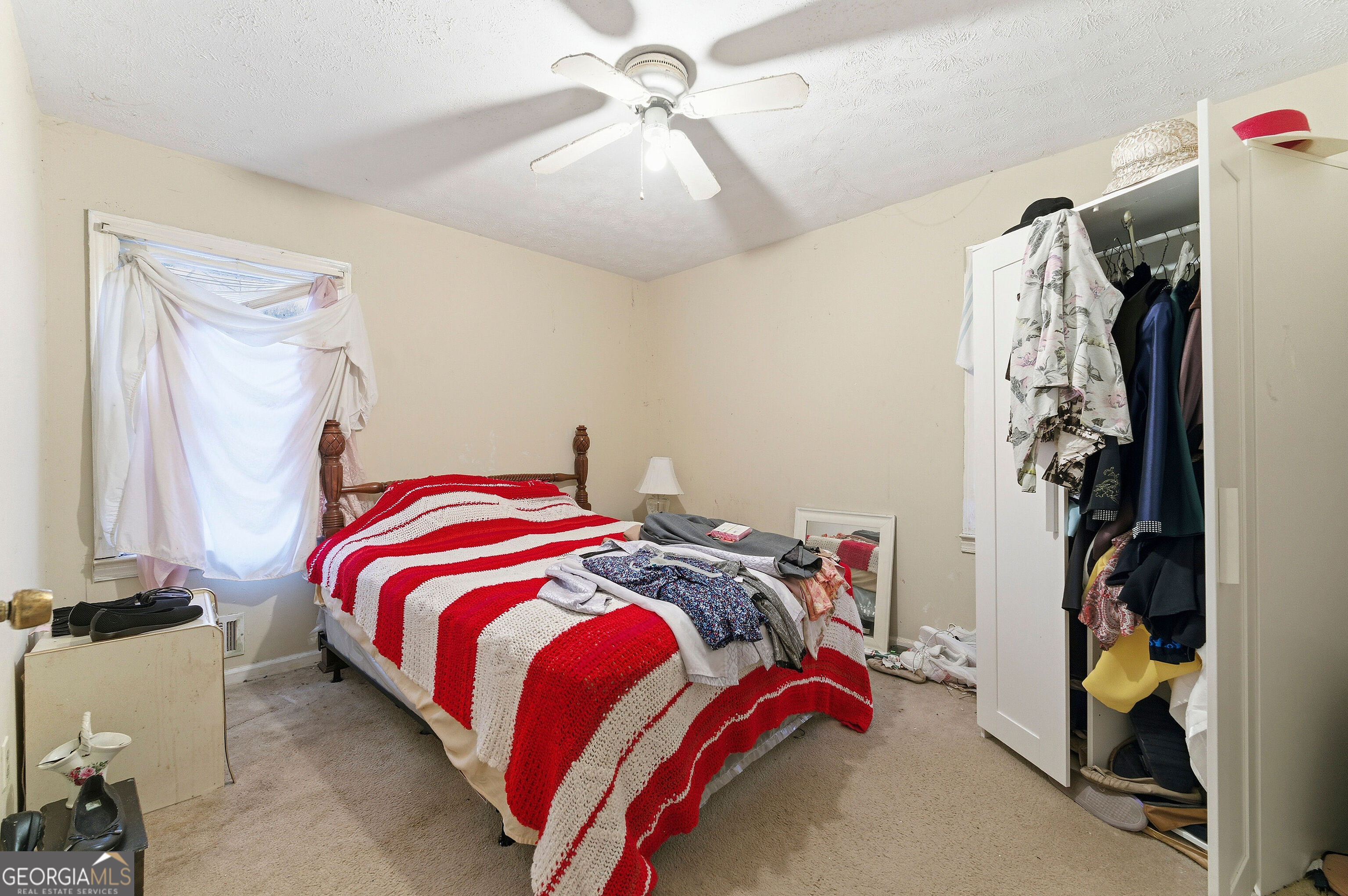 2848 Gresham Rd S East Atlanta, GA 30316 - Photo 10 of 20 a bedroom with a bed and a window