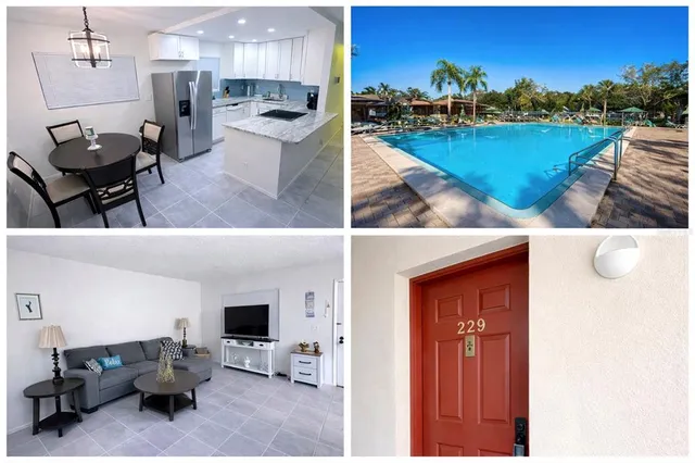 a kitchen with stainless steel appliances granite countertop a sink dishwasher a refrigerator and a stove with wooden floor