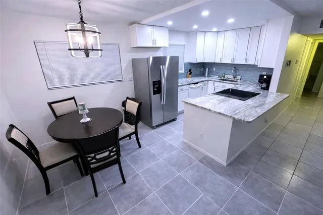 a bathroom with a sink toilet and mirror