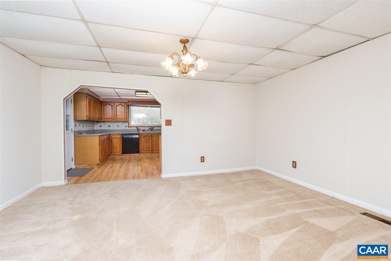 53 McKamy Springs Road Middlebrook, VA 24459 - Photo 12 of 46 a view of a livingroom with a chandelier fan and wooden floor