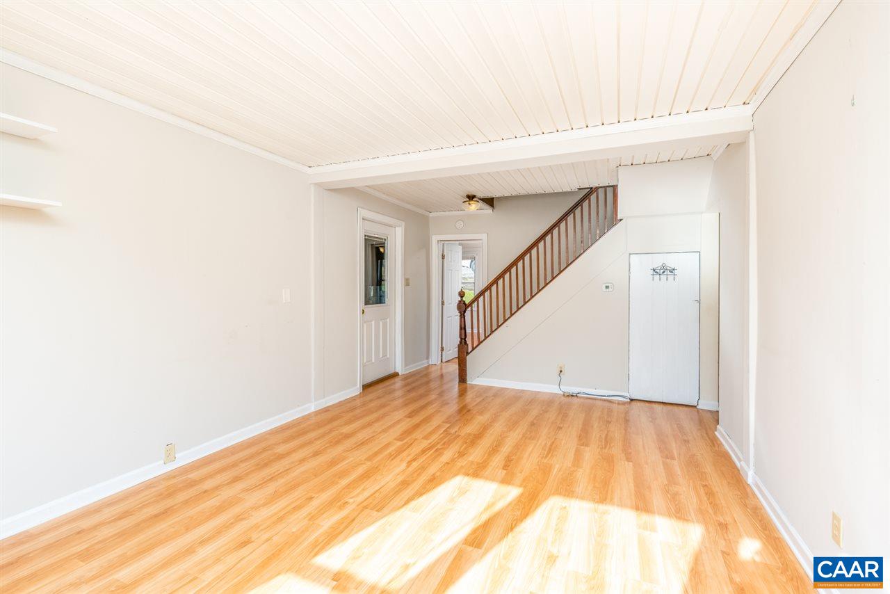 53 McKamy Springs Road Middlebrook, VA 24459 - Photo 6 of 46 a view of a big room with wooden floor and stairs
