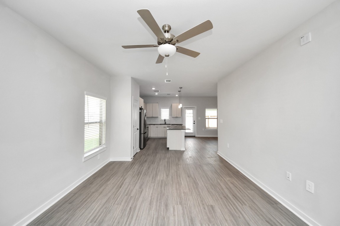 7711 Longmire Road, Unit 158 Conroe, TX 77304 - Photo 44 of 48 Open Concept Floor Plan with wood-like floors throughout!