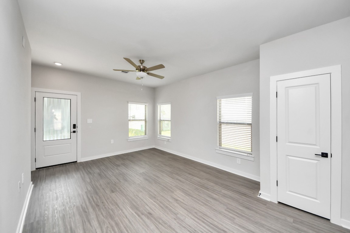 7711 Longmire Road, Unit 158 Conroe, TX 77304 - Photo 46 of 48 Open Concept Floor Plan with wood-like floors throughout!