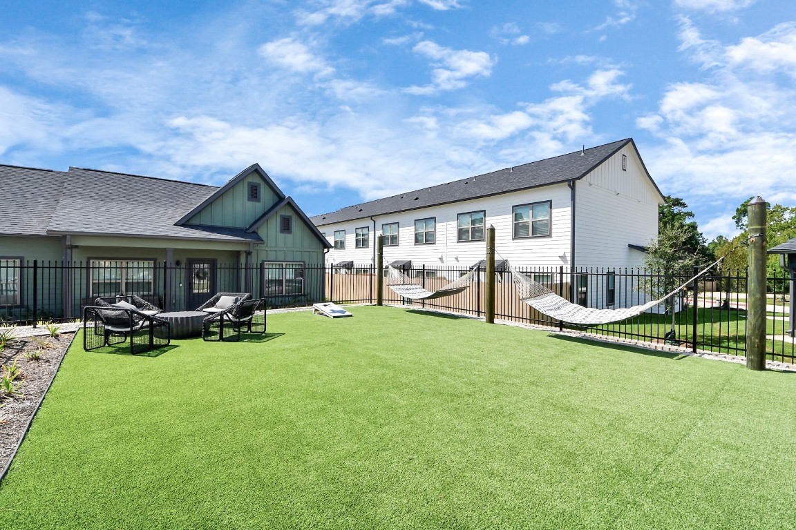 7711 Longmire Road, Unit 158 Conroe, TX 77304 - Photo 22 of 48 Enjoy an abundance of Amenities:Resort-Style Pool w/Sundeck Ledge&Outdoor Lounge Areas w/Grilling area,Gaming Lawn,Pickleball Court,Quaint Dog Park for your fur babies!24/7 Fitness Center w/Kids Play Zone area.Stunning Clubhouse w/Café/Lounge.Playground Area.Electric Vehicle Charging Stations!