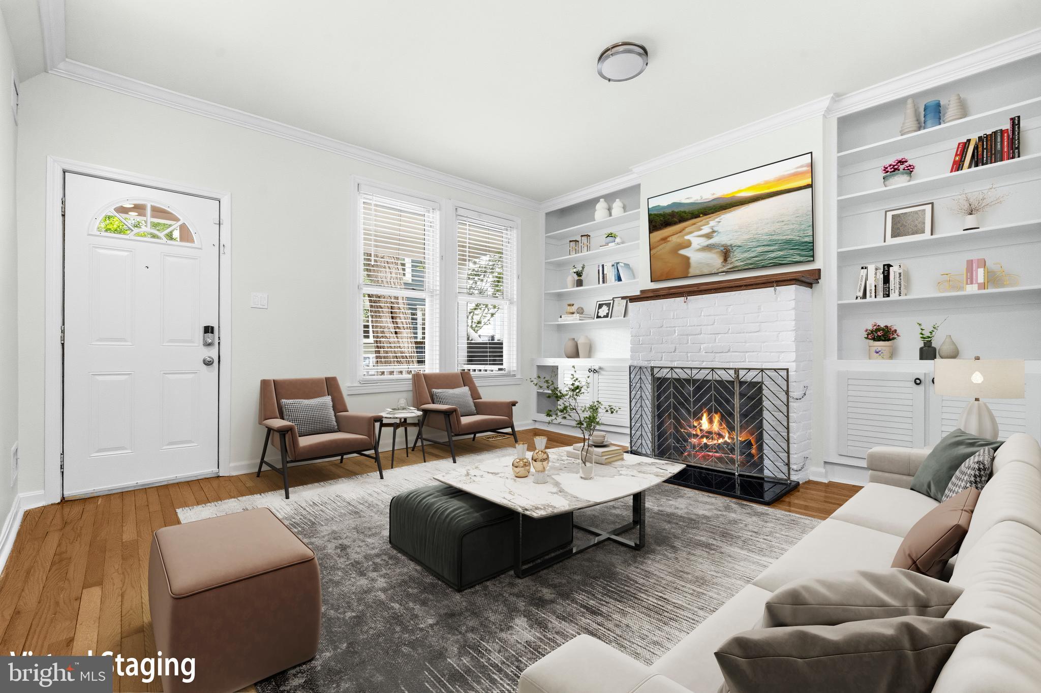 1504 Gales Street Northeast Washington, DC 20002 - Photo 2 of 24 a living room with furniture and a fireplace